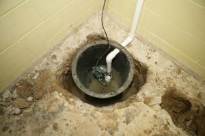 image of a sump pump in the ground
